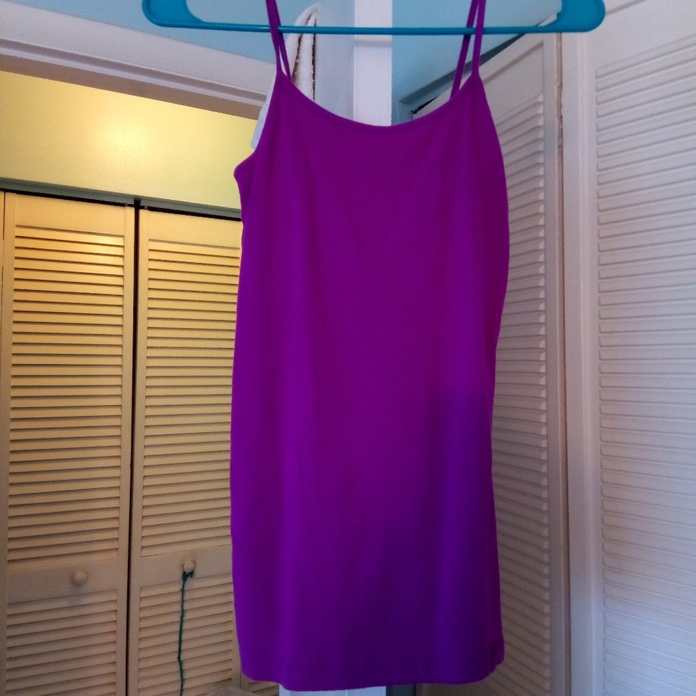 3 tank tops. Never wore. The last pic is actually